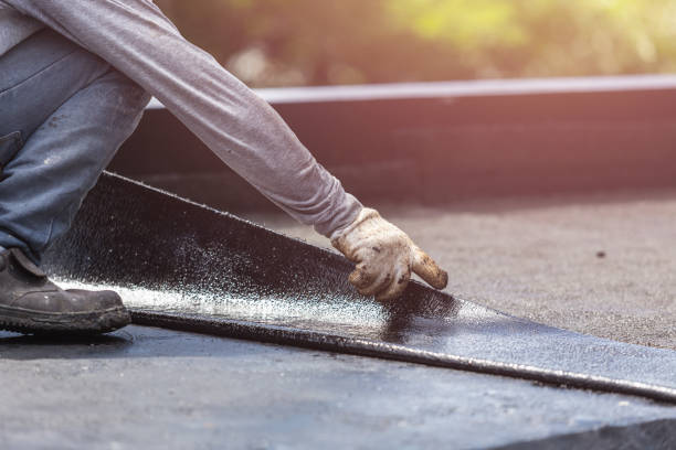 Professional Interior Drainage System technician working in Massapequa Park, NY